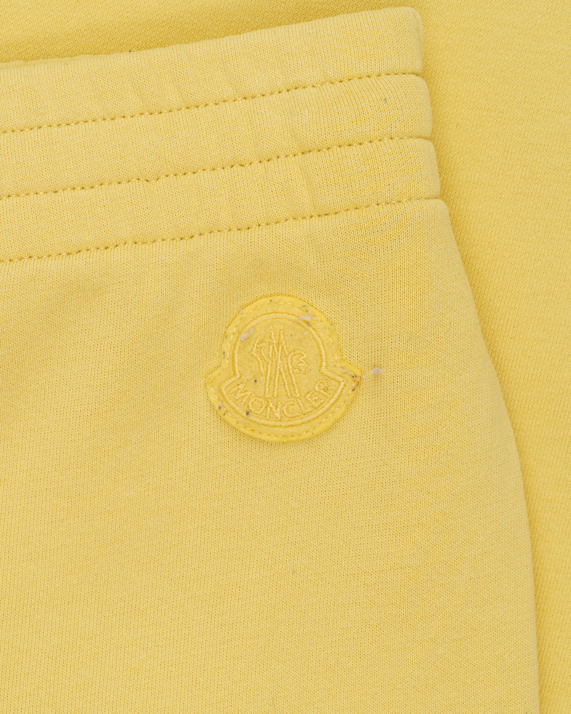 Moncler logo patch wide leg yellow sweatpants