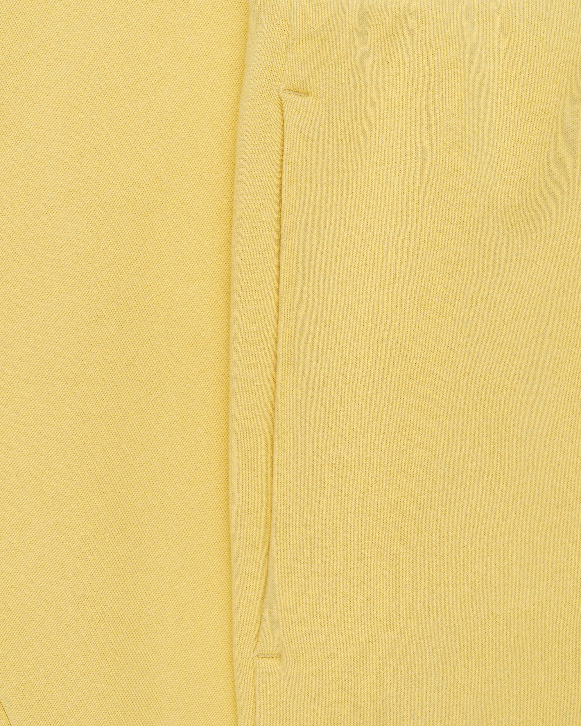Moncler logo patch wide leg yellow sweatpants