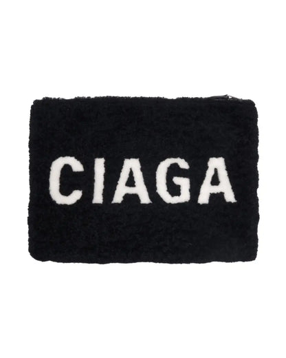 Balenciaga black shearling merino lamb logo zip clutch bag Balenciaga