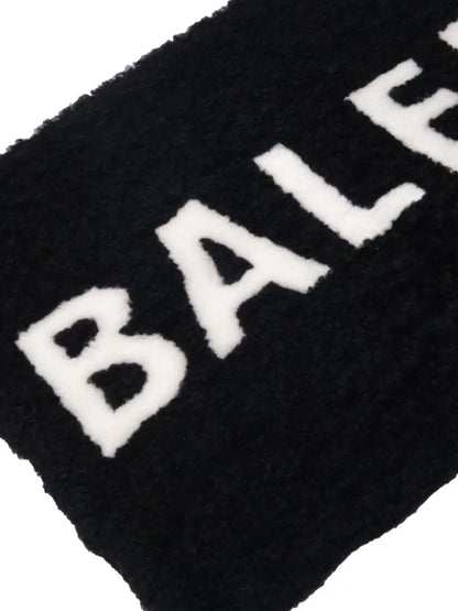 Balenciaga black shearling merino lamb logo zip clutch bag Balenciaga