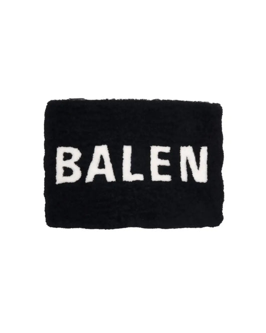 Balenciaga black shearling merino lamb logo zip clutch bag Balenciaga