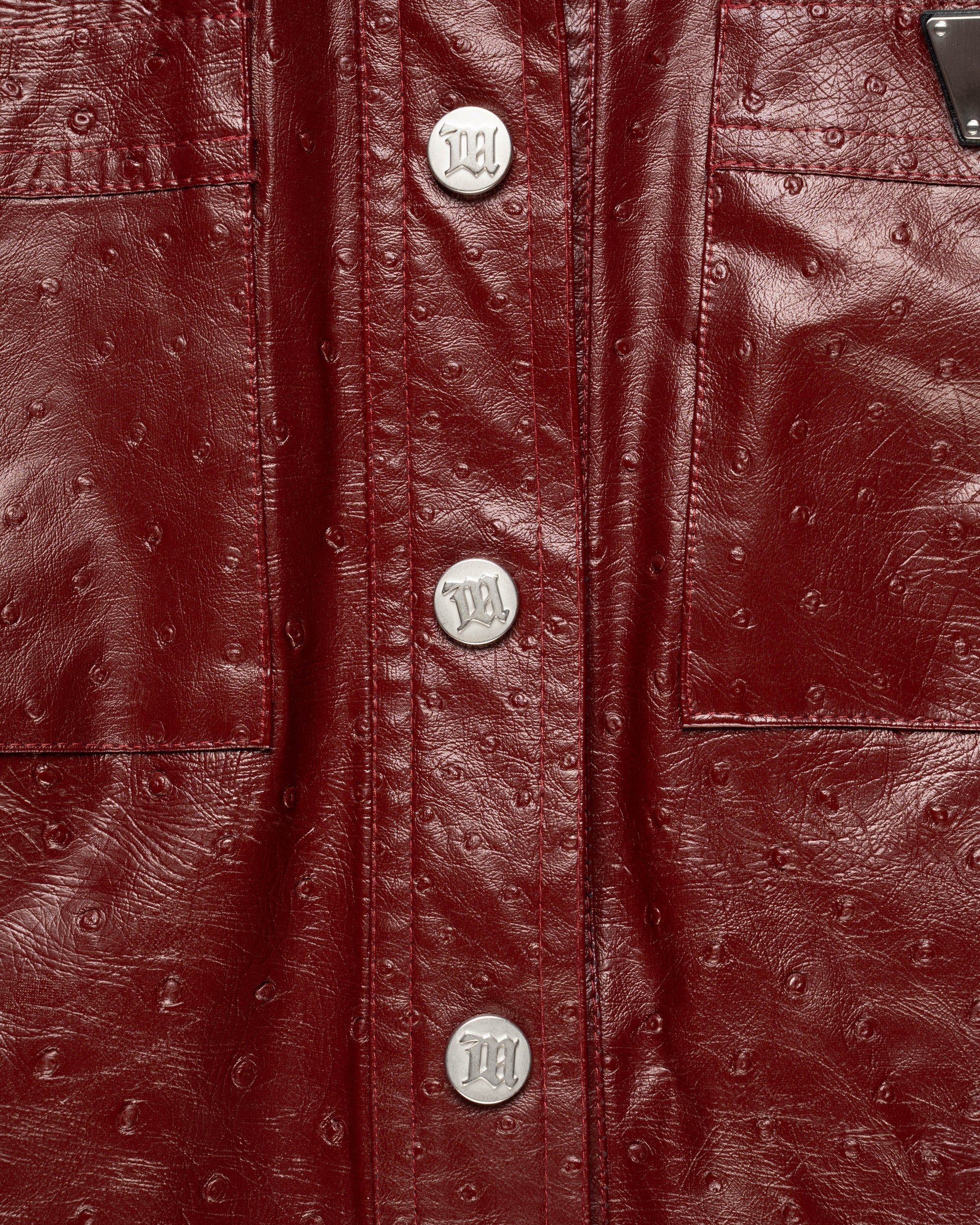 MISBHV 1-OF-1 faux ostrich leather metal logo plaque jacket