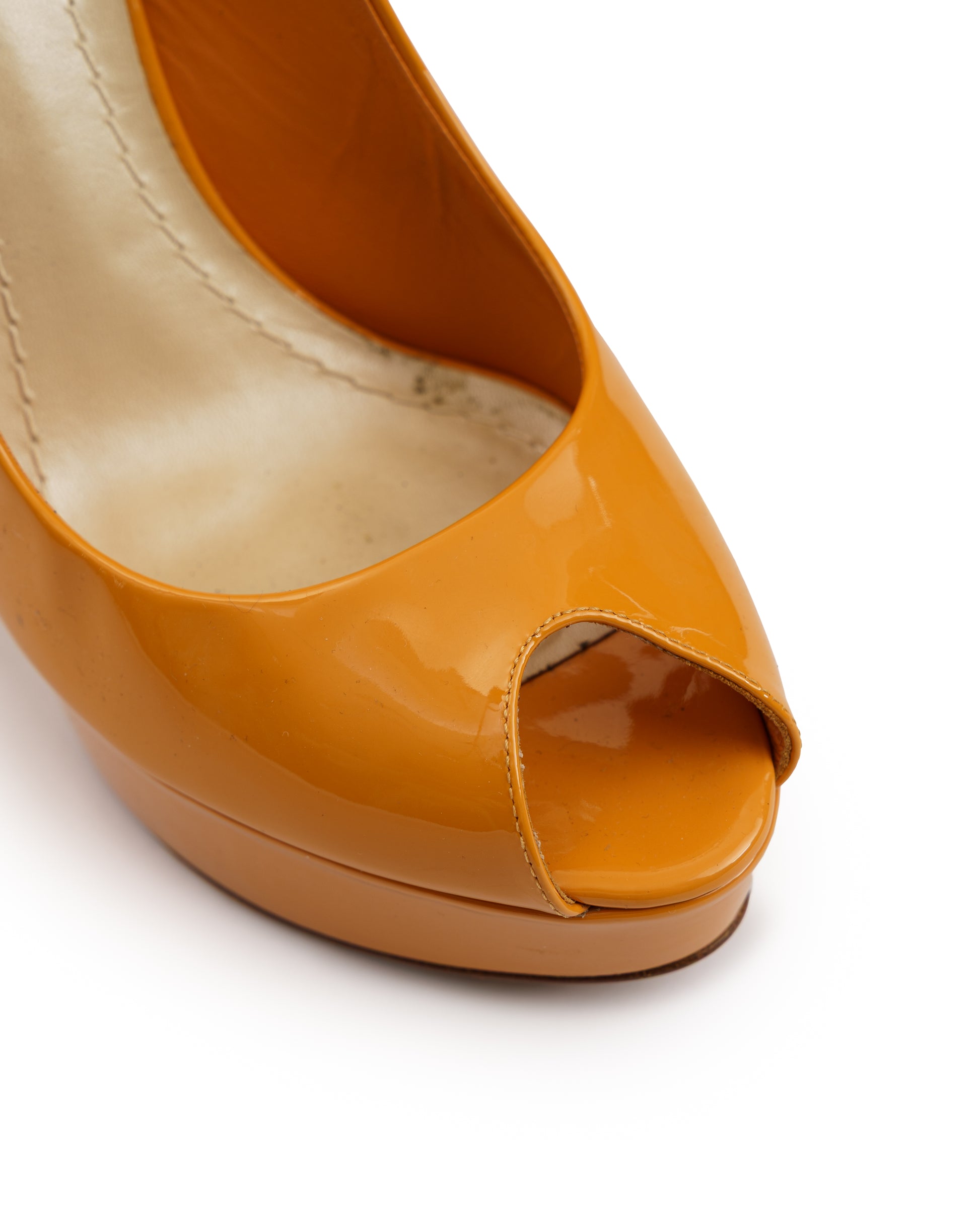 Christianior initial logo patent leather orange platform heels