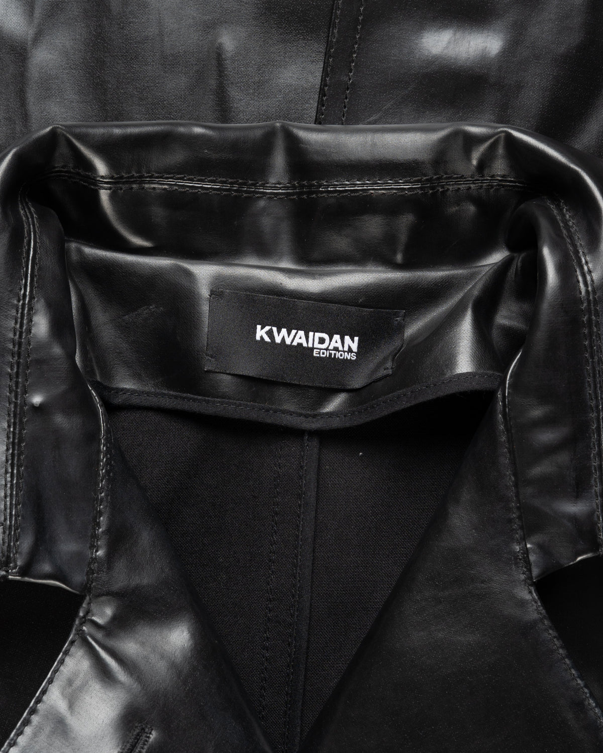Kwaidan Editions single-breasted rubber black coat