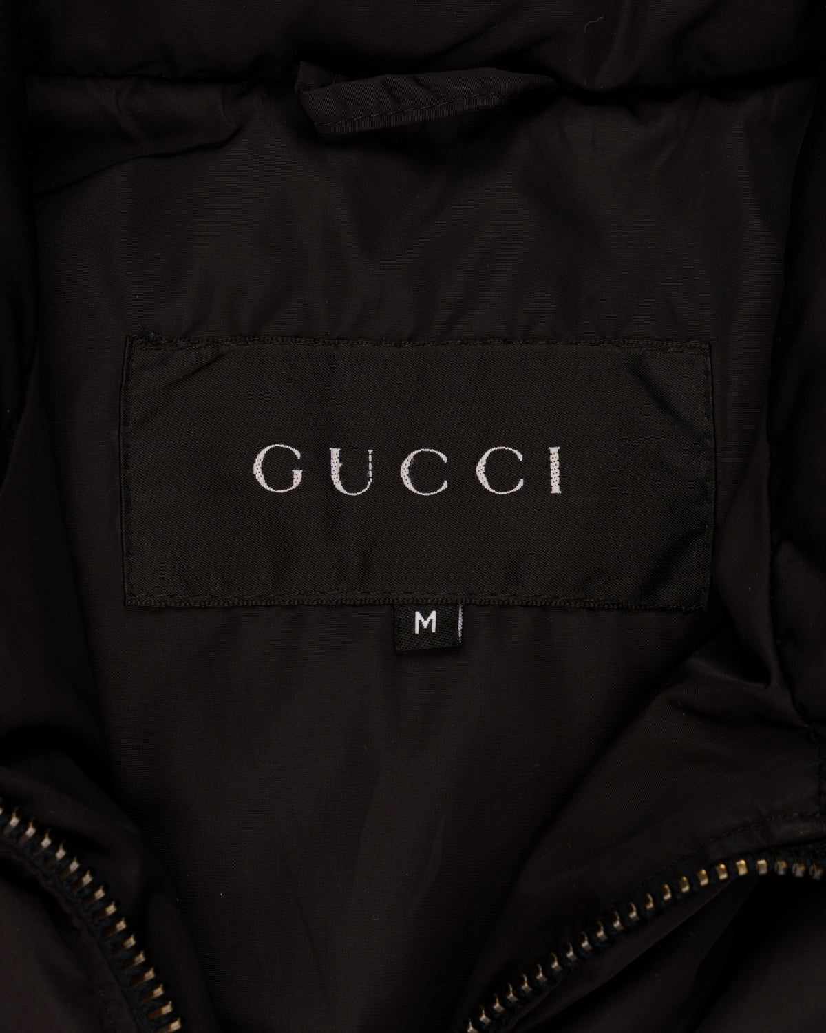 Gucci quilted down vest jacket