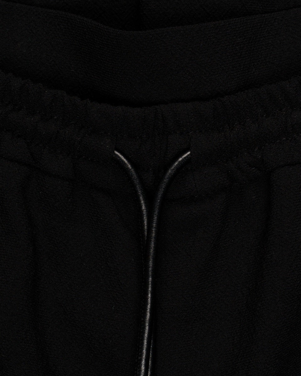 Loewe black georgette raw-edge trousers