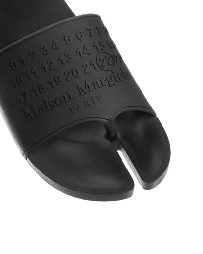 Maison Margiela Tabi spell-out logo slides Maison Margiela