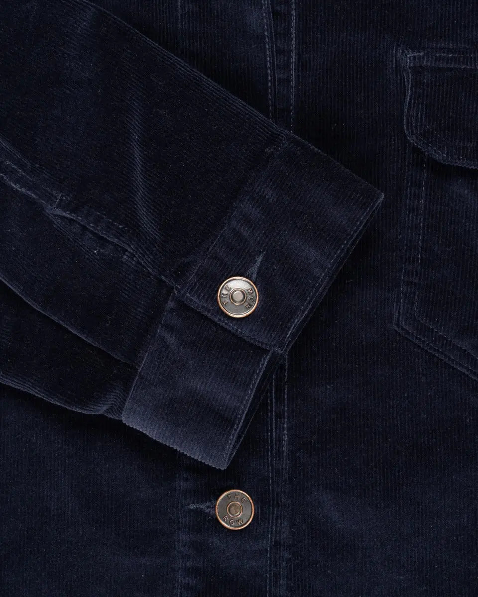The Row Lafayette corduroy navy trucker jacket